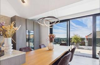 Wohnung kaufen in 63808 Haibach, Dachgeschosswohnung mit 4 m Deckenhöhe, Terrasse und direktem Aufzugzugang
