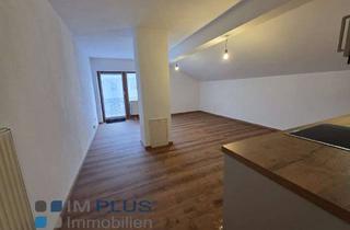 Wohnung kaufen in 83064 Raubling, Komplett neu renovierte 2 Zi.-DG-Wohnung in bester Lage von Raubling- super vermietet mit 4,40 %!