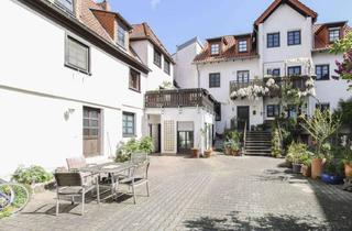 Wohnung kaufen in 65205 Erbenheim, Charmante Altbau-Maisonette im Fachwerkensemble – Kapitalanlage mit Entwicklungspotenzial