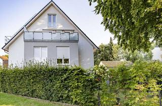 Wohnung kaufen in 33330 Gütersloh, Stilvolle Erdgeschosswohnung mit Garten