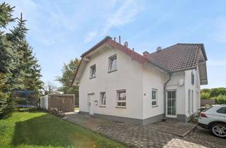 Doppelhaushälfte kaufen in 65604 Elz, Charmante Doppelhaushälfte mit viel Platz – Ihr neues Zuhause in Elz-Malmeneich