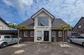 Einfamilienhaus kaufen in 41836 Hückelhoven, Urlaubsfeeling für die gesamte Familie – traumhaftes Einfamilienhaus mit Pool, Sauna & Wintergarten