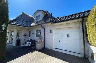 Einfamilienhaus kaufen in 25355 Barmstedt, Exklusives Einfamilienhaus in traumhafter Parklage