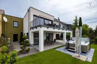 Einfamilienhaus kaufen in 97264 Helmstadt, Wohnen mit Komfort: Einfamilienhaus mit Einliegerwohnung, Wärmepumpe & Fußbodenheizung