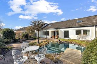 Reihenhaus kaufen in Lahriede, 30916 Isernhagen, Komfortables Familiendomizil in Altwarmbüchen: 200 qm-Reihenhaus mit zwei Ebenen, Garten, Sauna