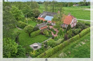 Haus kaufen in 26802 Moormerland, Top gepflegtes, historisches Anwesen mit Backhaus und Gartenanlage in idyllischer Lage!