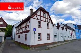 Grundstück zu kaufen in 63165 Mühlheim, Wohnbaugrundstück mit Baugenehmigung in zentraler Lage! - Altbestand vermietet!