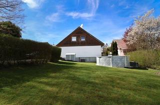 Wohnung kaufen in 53819 Neunkirchen-Seelscheid, Wohnen mit Hausgefühl: Gemütliche Erdgeschosswohnung im Zweiparteienhaus mit großer Terrasse