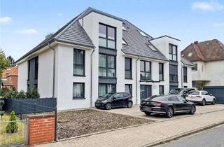 Wohnung kaufen in 30926 Seelze, Moderne 4-Zimmer-Erdgeschosswohnung mit eigenem Garten und Garage in zentraler Lage von Seelze