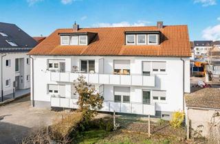 Mehrfamilienhaus kaufen in 68753 Waghäusel, Modernisiertes Mehrfamilienhaus mit sechs Wohneinheiten und Garagen in Waghäusel