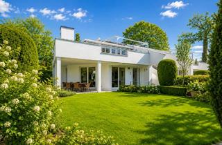 Wohnung kaufen in 82031 Grünwald, Stilvolle Gartenwohnung in exklusiver Ensemblevilla