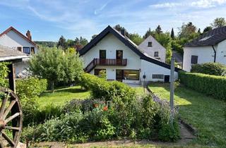 Einfamilienhaus kaufen in 66346 Püttlingen, Püttlingen - Modernisiertes Ein- bis Zweifamilienhaus mit großem Garten