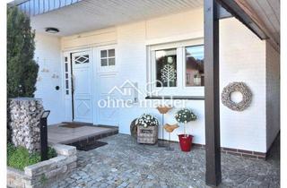 Haus kaufen in 28844 Weyhe, Flachdachbungalow (Reihenendhaus) auf 546 qm Grundstück mit zwei Bädern, Garage und Carport