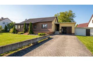 Haus kaufen in 86647 Buttenwiesen, Großzügiger Bungalow auf ca. 2.000 m² Grundstück mit Wintergarten & Ausbaupotenzial