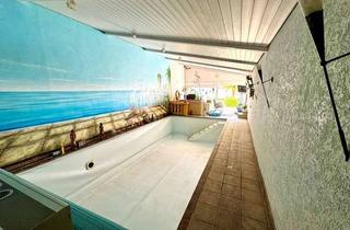 Haus kaufen in 68199 Neckarau, Einfamilienwohnhaus mit Indoor Pool und Garage in MA-Neckarau.