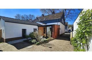 Doppelhaushälfte kaufen in 45326 Altenessen-Süd, Doppelhaushälfte mit Garage und Garten in ruhiger Wohngegend