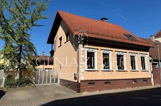 Einfamilienhaus kaufen in 68794 Oberhausen-Rheinhausen, Einfamilienhaus mit großzügigem Platzangebot und Entwicklungsperspektive