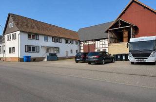 Grundstück zu kaufen in 35410 Hungen, Baugrundstück und Mehrfamilienhaus mit 7 Einheiten