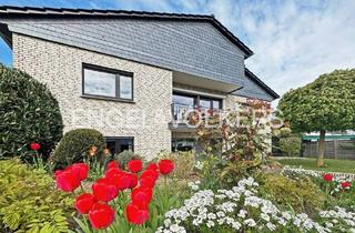 Einfamilienhaus kaufen in 61194 Niddatal, Niddatal - Modernisiertes Raumwunder in traumhafter Feldrandlage