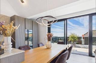 Wohnung kaufen in 63808 Haibach, Haibach - Dachgeschosswohnung mit 4 m Deckenhöhe, Terrasse und direktem Aufzugzugang