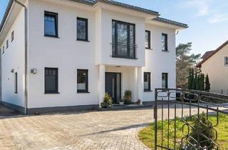 Einfamilienhaus kaufen in 14612 Falkensee, Falkensee - Exklusiver Neubau nahe Berlin - Energieeffizienz A+ & moderner Wohnkomfort