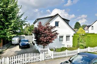 Einfamilienhaus kaufen in 21465 Reinbek, Charmantes freistehendes Einfamilienhaus mit liebevoll angelegtem Garten