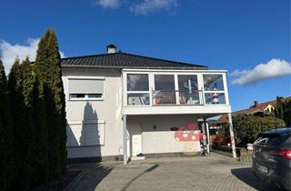 Einfamilienhaus kaufen in 36391 Sinntal, Exklusives Familiendomizil mit Einliegerwohnung, Pool und weitläufigem Grundstück