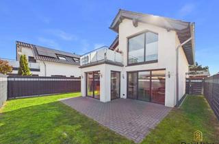 Wohnung kaufen in 46509 Xanten, Wohnen auf einer Ebene: Helle 84-m²-Wohnung mit eigenem Garten & Garage in Xanten-Vynen