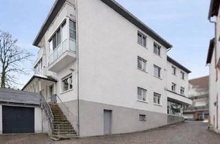 Anlageobjekt in 35075 Gladenbach, Attraktives Renditeobjekt: Wohn- und Geschäftshaus in exponierter Innenstadtlage von Gladenbach
