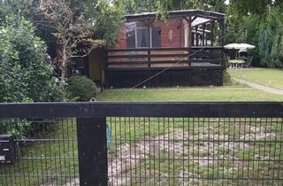 Haus kaufen in 67575 Eich, Eich - Holz-Bungalow mit Bootssteg am Eicher See