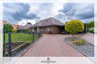 Haus kaufen in 26842 Ostrhauderfehn, Großzügiger Bungalow mit D-Carport, Gartenanlage und Terrasse in ruhiger Lage!