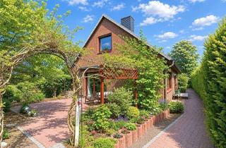 Einfamilienhaus kaufen in 25462 Rellingen, Attraktives Einfamilienhaus mit Vollkeller und hübschem Garten in Rellingen