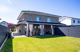 Haus kaufen in Neustadtstr. 57a, 49163 Bohmte, Exklusive neuwertige Haushälfte in familienfreundlicher Lage von Bohmte!