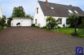 Doppelhaushälfte kaufen in 28307 Arbergen, Charmante Doppelhaushälfte mit Wintergarten, großem Grundstück & viel Potenzial in Bremen