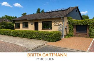 Haus kaufen in 26725 Petkum, Exklusives Wassergrundstück mit gepflegtem Bungalow und Bootsanleger in traumhafter Lage