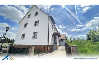 Doppelhaushälfte kaufen in 37115 Duderstadt, Doppelhaushälfte mit Wintergarten und Nebengebäude auf großzügigem Grundstück!