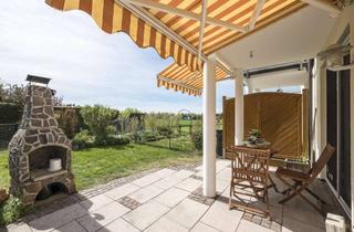 Wohnung kaufen in 82178 Puchheim, Maisonettewohnung mit großem Garten am Feldrand