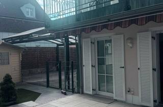 Wohnung kaufen in Kolping Straße 24, 85290 Geisenfeld, Charmante 3-Zimmer-Gartenwohnung mit Terrasse & Gartenhaus im Herzen von Geisenfeld