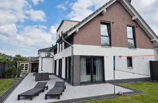 Einfamilienhaus kaufen in 53340 Meckenheim, Modernes, energieeffizientes Einfamilienhaus mit Garten, Doppelgarage und hochwertiger Ausstattung
