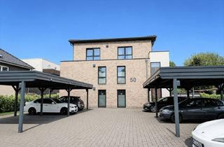 Wohnung kaufen in 26817 Rhauderfehn, Rhauderfehn: Junge, helle Dreizimmerwohnung mit Carport