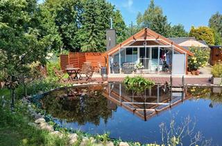 Haus kaufen in 24855 Jübek, Jübek - EFH Holzhaus auf schönem Grundstück mit Badeteich von Privat!