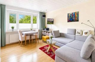 Wohnung kaufen in 26725 Borssum/Hilmarsum, Modernisierte 3-Zimmer-Wohnung mit Balkon und Garage