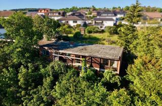 Haus kaufen in 36272 Niederaula, Idyllisches Wohnen in Niederaula, Haus mit Terrasse, Garten & viel Potential
