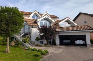 Haus kaufen in Johann-Matthie-Straße, 56235 Ransbach-Baumbach, Großzügiges Haus mit 213 m² Wohnfläche in familienfreundlicher Lage in Ransbach-Baumbach