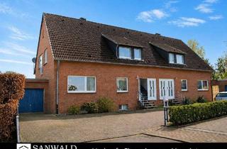 Haus kaufen in 41836 Hückelhoven, Hückelhoven - Charmantes Zweifamilienhaus mit Garten und Garage in beliebter Wohnlage