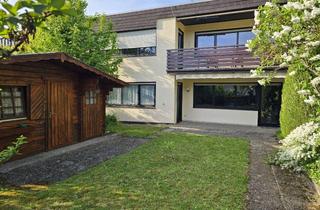 Haus kaufen in 35428 Langgöns, Reihenmittelhaus mit viel Platz, Garage, Stellplatz und Gartenhaus