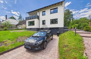 Haus kaufen in 32584 Löhne, Hochwertig saniertes Zweifamilienhaus mit Terrasse, Balkon & Ausbaureserve