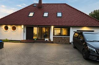 Einfamilienhaus kaufen in 25348 Blomesche Wildnis, Exklusives Einfamilienhaus mit Wasserzugang, mediterraner Terrasse und Traumgrundstück. Ohne Makler