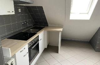 Wohnung kaufen in 38302 Wolfenbüttel, Wolfenbüttel - 2-Zi.-Dachgeschosswohnung mit Stellplatz & Gartenmitbenutzung