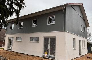 Haus kaufen in 32469 Petershagen, Petershagen - Zweifamilienhaus kaufen - Neubau mit 2 Wohnungen - provisionsfrei